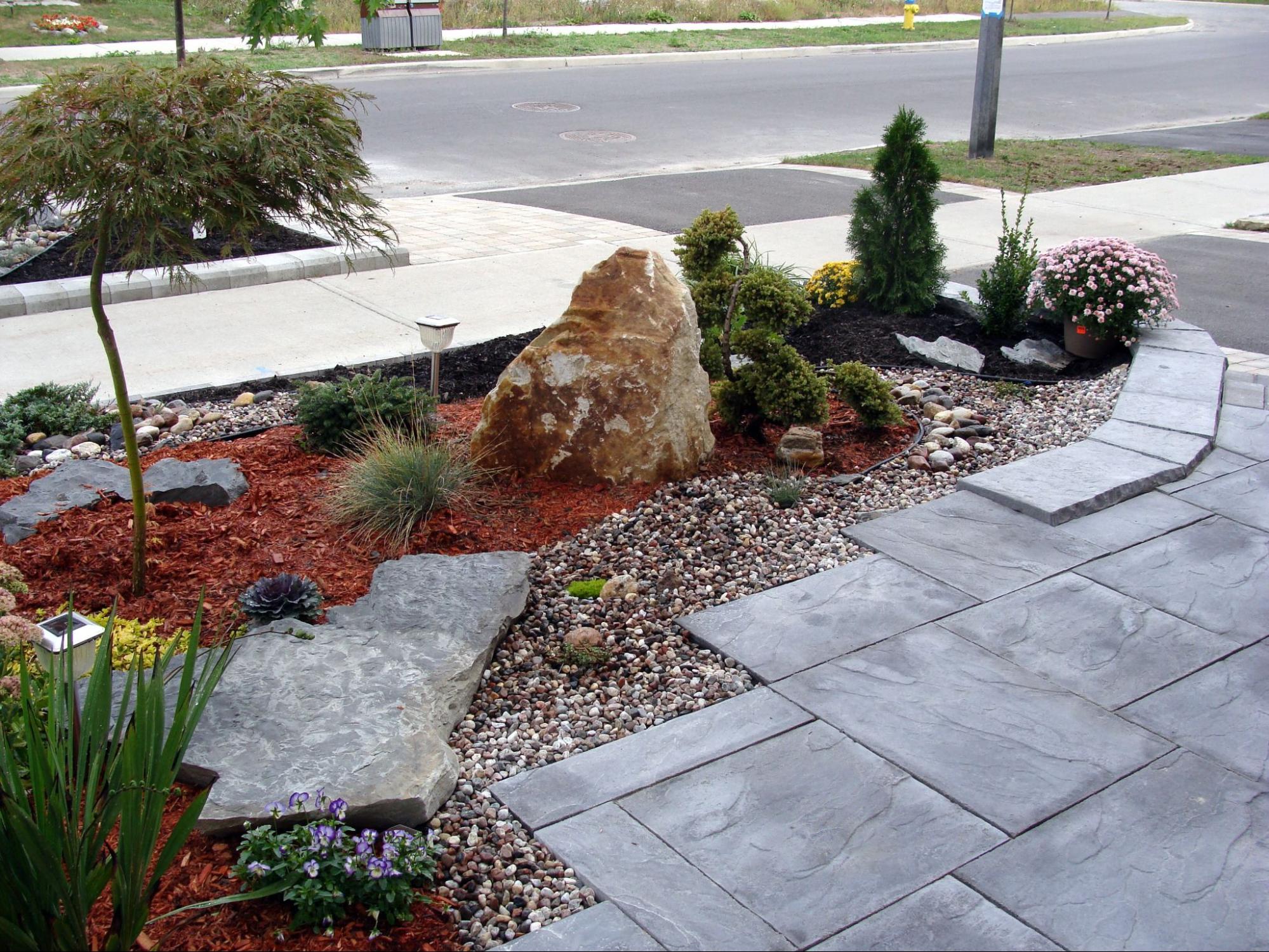 Garden walkway with decorative stone flooring.