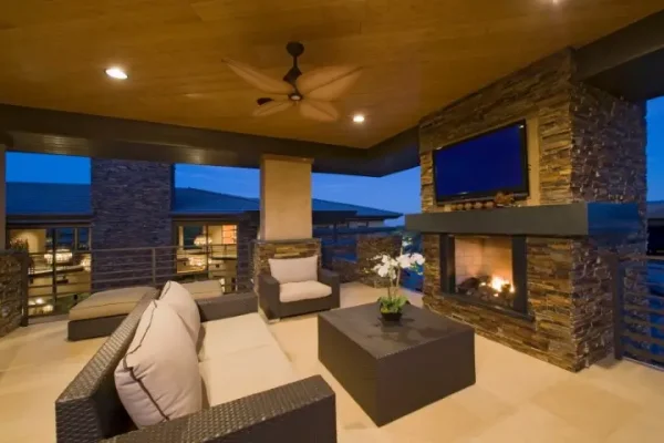 Interior of living room with fireplace in modern house.