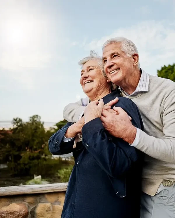 Sky, elderly couple and hug outdoors or happy in retirement or husband and wife in nature.